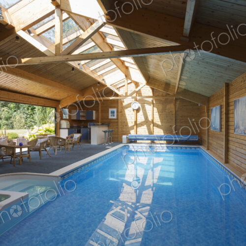 Indoor swimming pool under skylight Indoor swimming pool under skylight