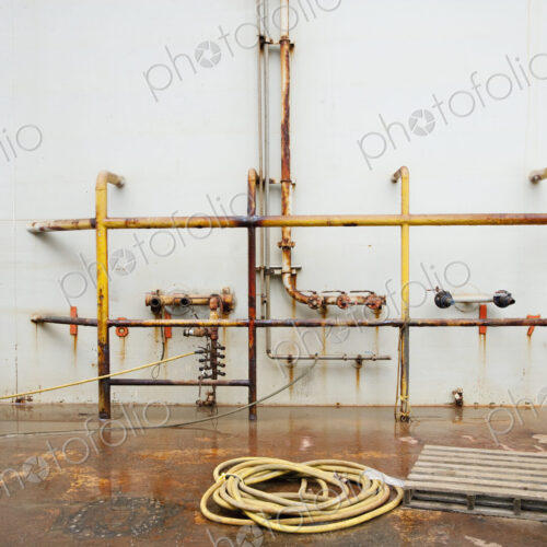 Industrial Building, pipework and ropes and two gas cannisters