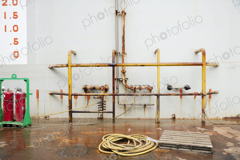 Industrial Building, pipework and ropes and two gas cannisters