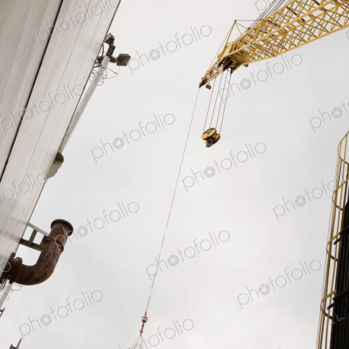Industrial Crane view from below, moving cargo