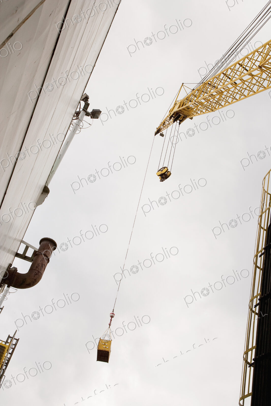 Industrial Crane view from below, moving cargo
