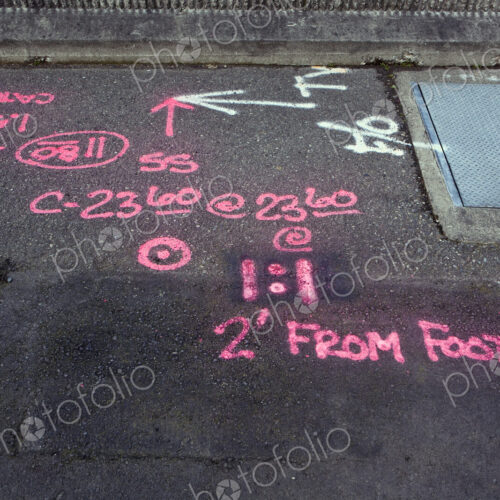 Information Painted on a Road for Road Crews Information Painted on a Road for Road Crews