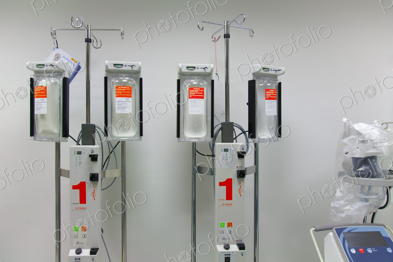 Infusers on drip stands in a modern hospital