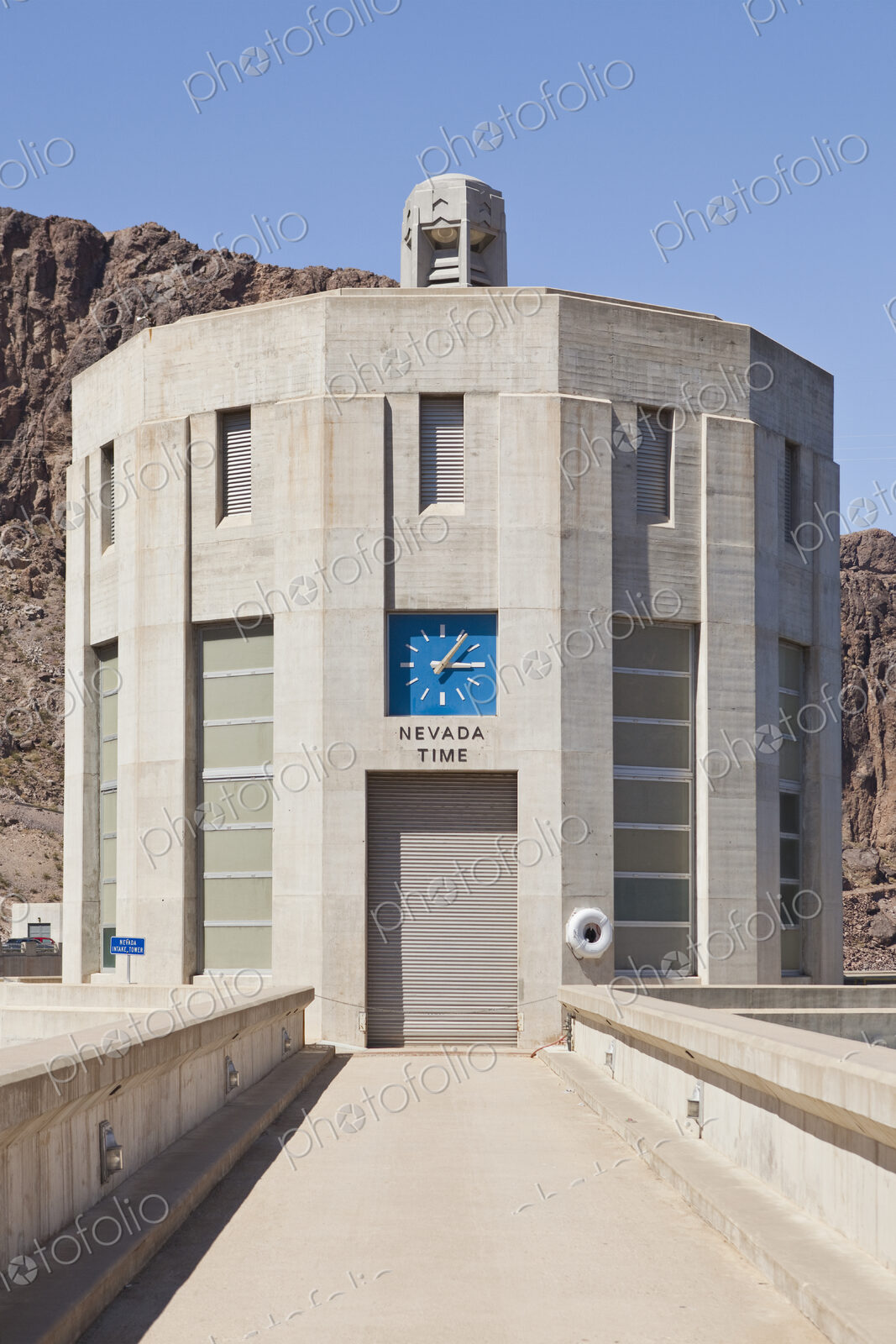 Intake tower exterior and pedestrian bridge at Hoover Dam and Lake Mead, a power…