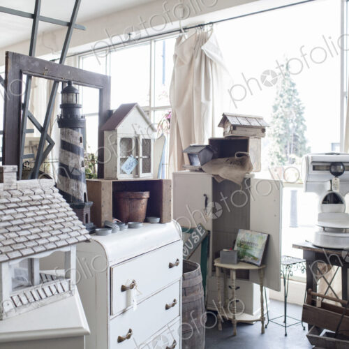 Interior of an antique store showing a number of products for sale. Interior of an antique store showing a number of products for sale.