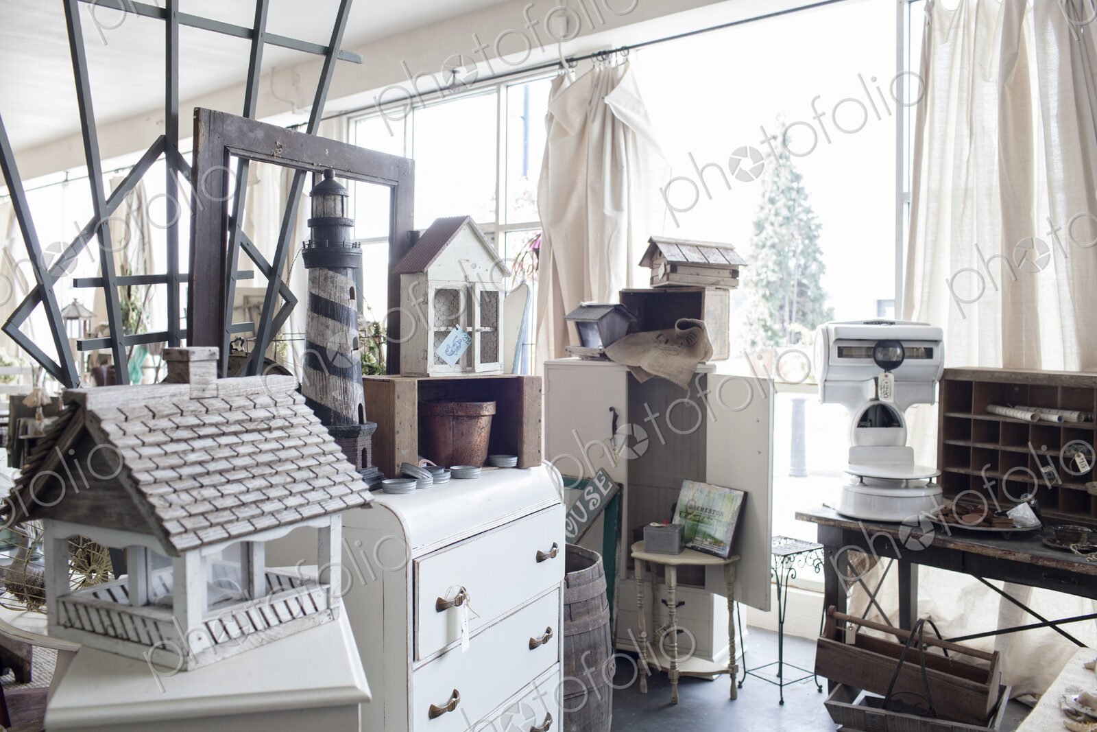 Interior of an antique store showing a number of products for sale.