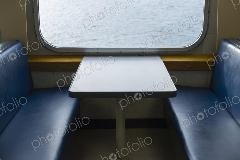 Interior of passenger ferry boat and view over the waters of Puget Sound.