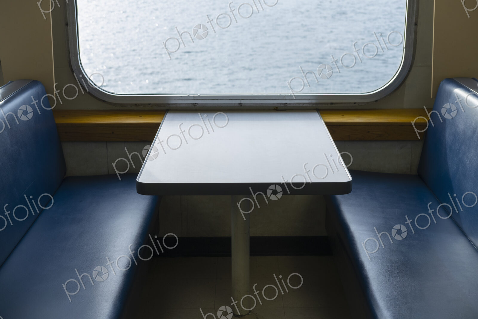 Interior of passenger ferry boat and view over the waters of Puget Sound.