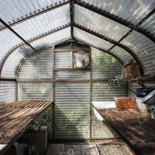 Interior of small new greenhouse. Interior of small new greenhouse.