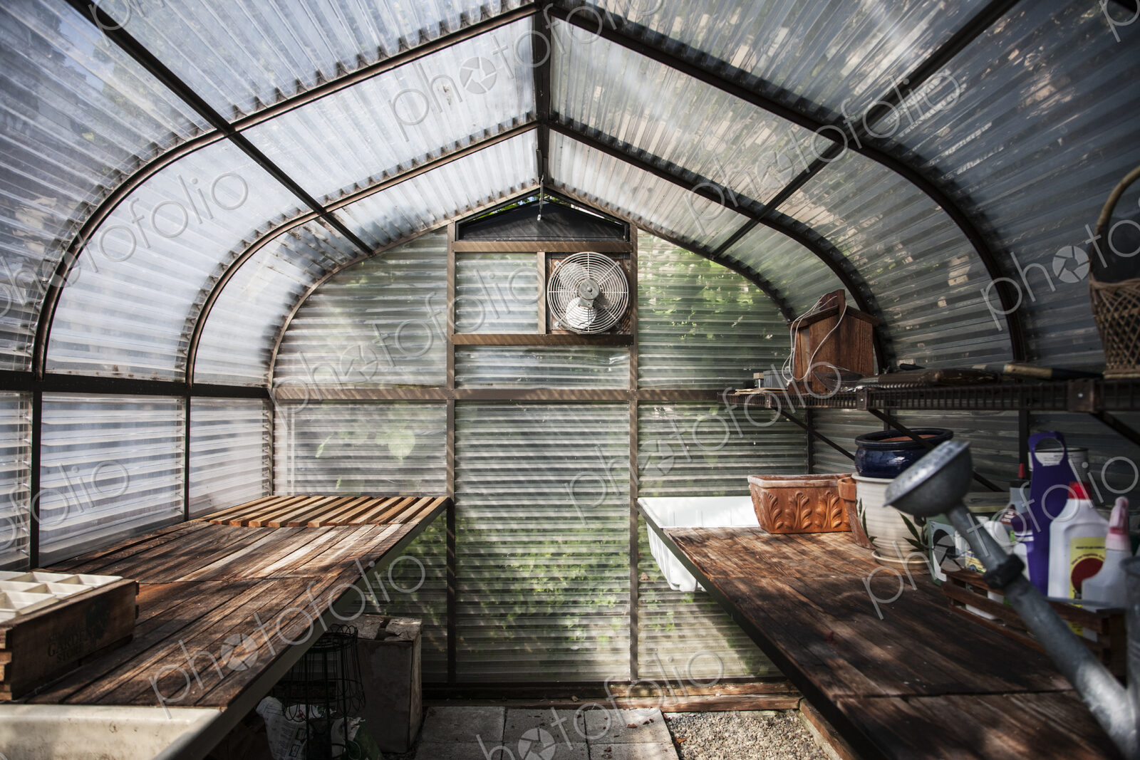Interior of small new greenhouse.