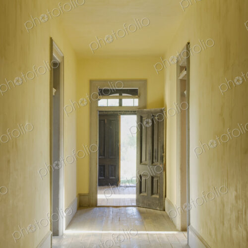 Interior view of a corridor in an abandoned building in Montana State Park.