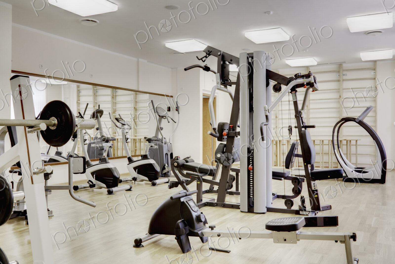 Interior view of a gymnasium, with exercise equipment.