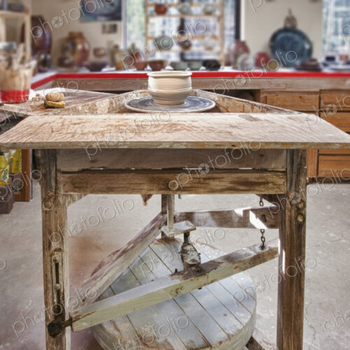 Interior view of a potter's workshop in Hockinson, the potters wheel and workbench,