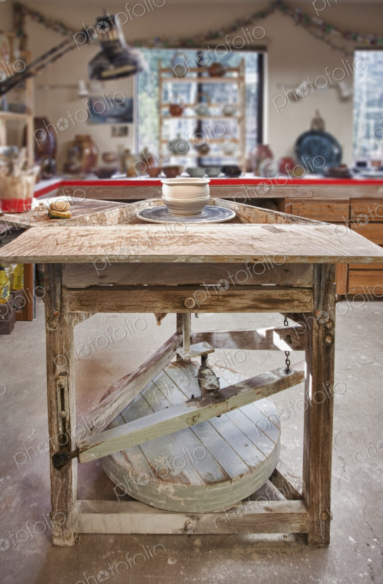Interior view of a potter's workshop in Hockinson, the potters wheel and workbench,