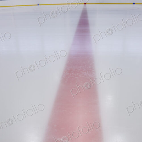 Interior view of an ice rink with ice hockey markings
