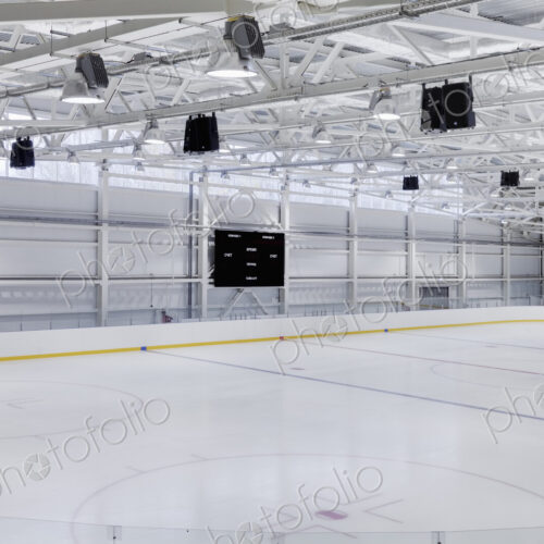 Interior view of an ice rink with ice hockey markings