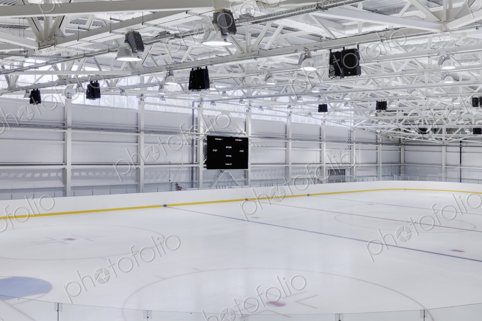 Interior view of an ice rink with ice hockey markings