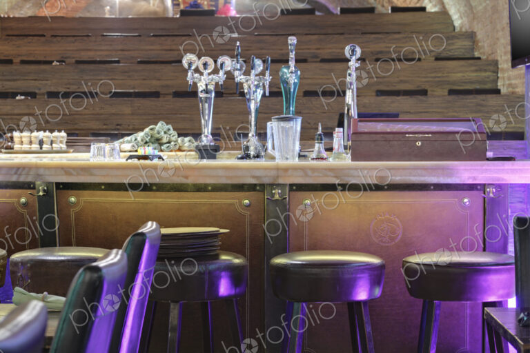 Interior view of bar area of a restaurant.