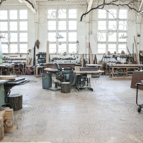 Interior view of machines in a woodworking factory.
