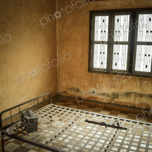 Interior view of prison cell at the Tuol Sleng Genocide Museum, Phnom Penh, Cambodia. Interior view of prison cell at the Tuol Sleng Genocide Museum, Phnom Penh, Cambodia.