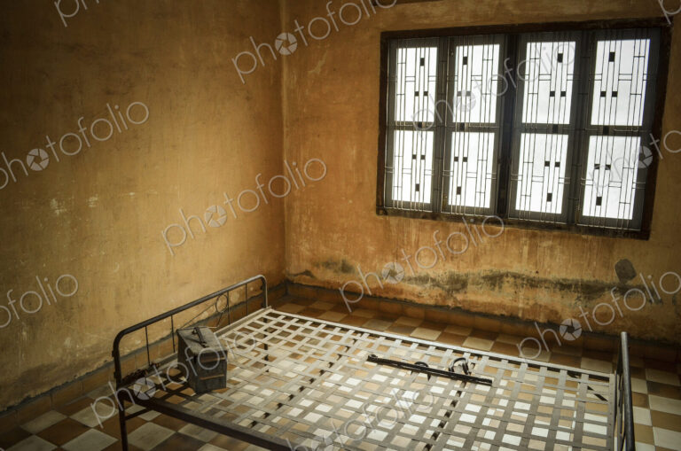 Interior view of prison cell at the Tuol Sleng Genocide Museum, Phnom Penh, Cambodia.