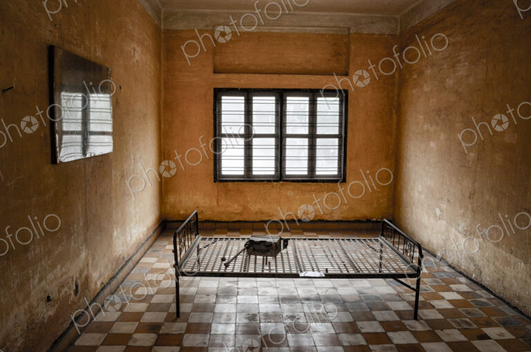 Interior view of prison cell at the Tuol Sleng Genocide Museum, Phnom Penh, Cambodia.
