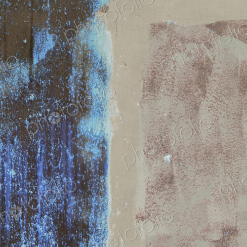 Inverted abstract image of rusty metal wall, half covered in paint, decay.