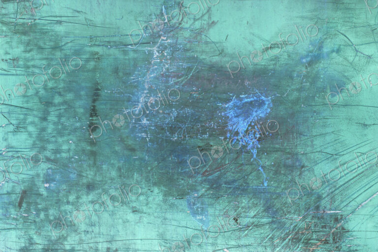 Inverted image of scratch marks and peeling paint on metal wall