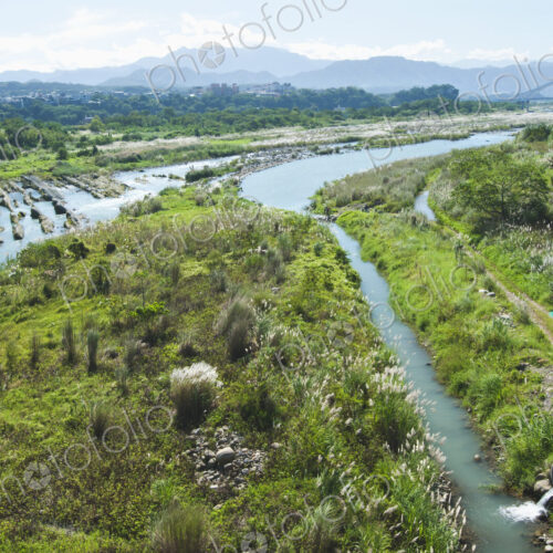 Irrigation channels and a drainage overflow ditch cut into the landscape by a river. Irrigation channels and a drainage overflow ditch cut into the landscape by a river.