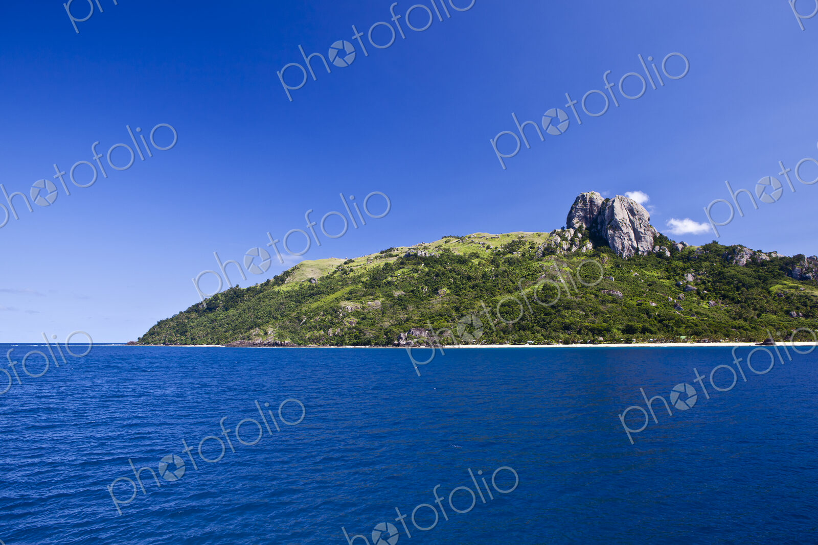 Island With Rocks On Hilltop