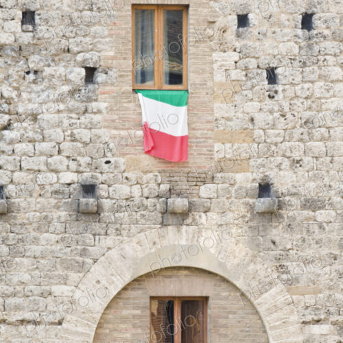 Italian Flag Flying on a Medieval Building
