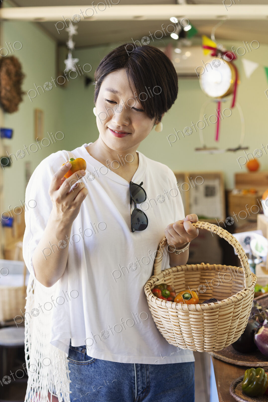 Japanese women shopping fresh vegetables in a farm shop.