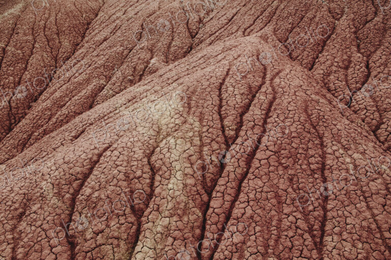 John Day Fossil Beds National Monument. Red rock formations and folds in the rock,…