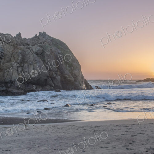 Julia Pfeiffer Burns State Park, view of the rock arch and headland at sunset. Julia Pfeiffer Burns State Park, view of the rock arch and headland at sunset.