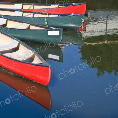 Kayak boats on the River Thames Kayak boats on the River Thames