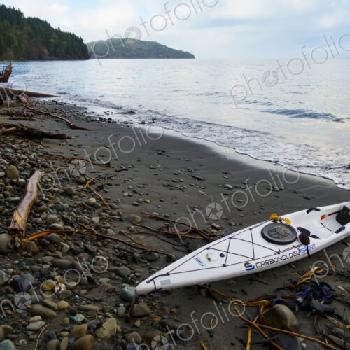Kayak on remote wilderness beach, Port Angeles, WA, USA