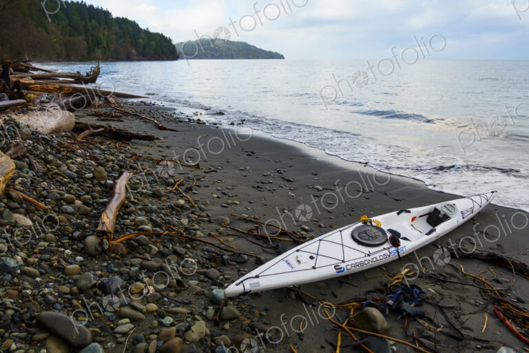 Kayak on remote wilderness beach, Port Angeles, WA, USA