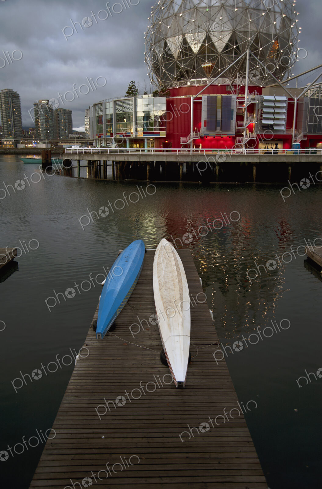 Kayaks on the water across the harbour from Science World, Vancouver.