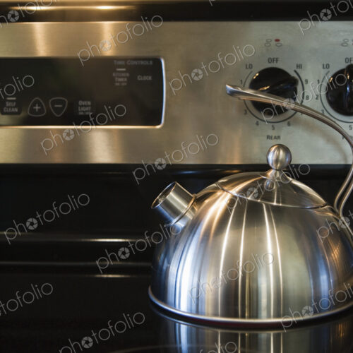 Kettle on a Stove Range Kettle on a Stove Range