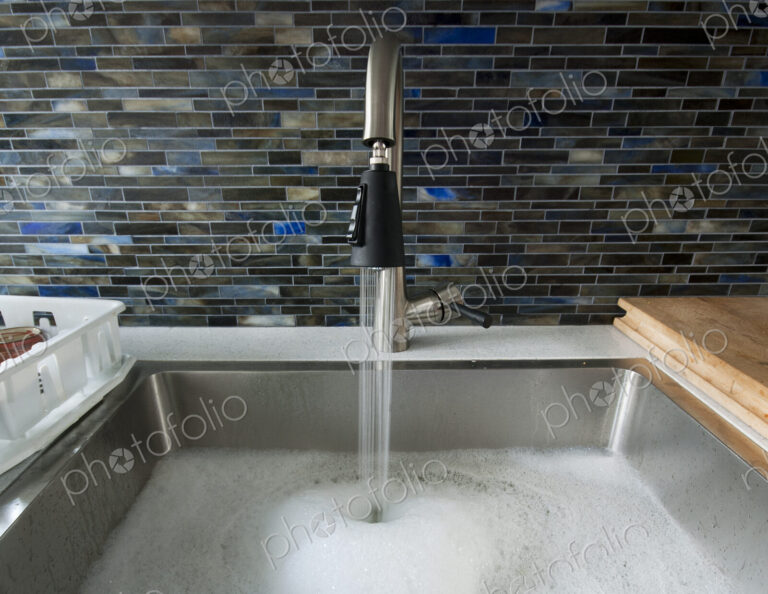 Kitchen Sink With Soapy Water