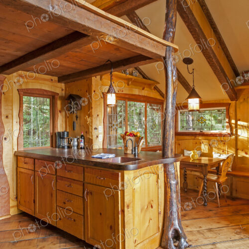 Kitchen and loft in wooden tree house Kitchen and loft in wooden tree house