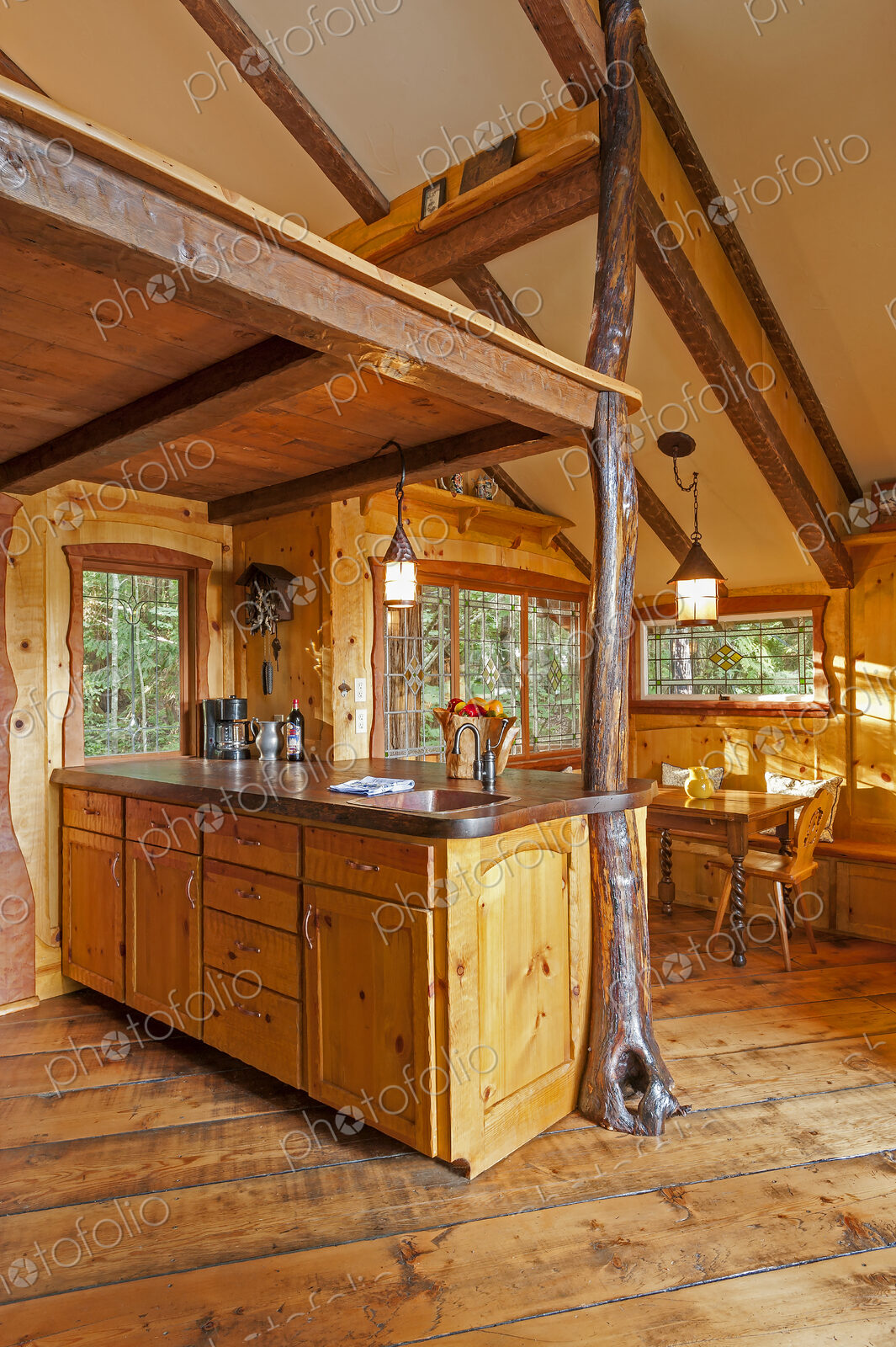 Kitchen and loft in wooden tree house