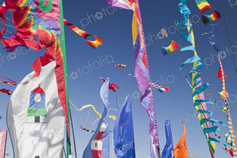Kites, banners and streamers waving in the wind.