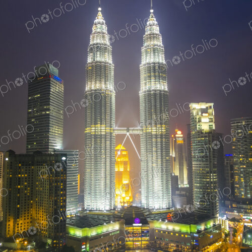 Kuala Lumpur in the evening, with the illuminated Petronas Towers