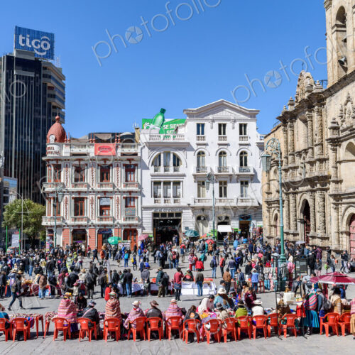 La Paz, a city square, a large group of people at market stalls outside the large… La Paz, a city square, a large group of people at market stalls outside the large…