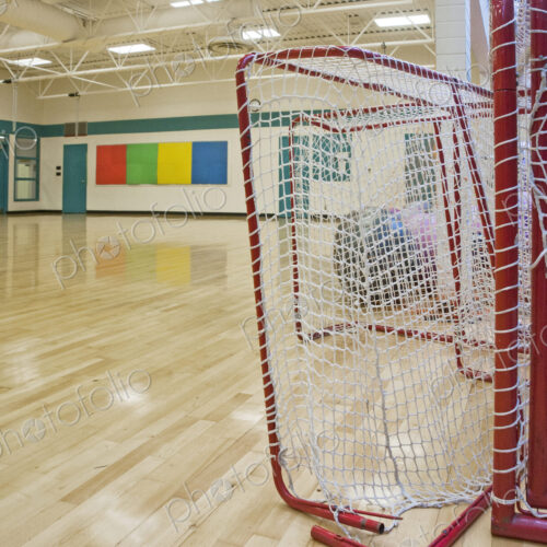 Lacrosse Goals in a Gymnasium
