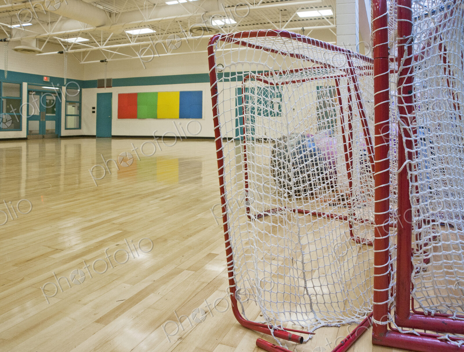 Lacrosse Goals in a Gymnasium