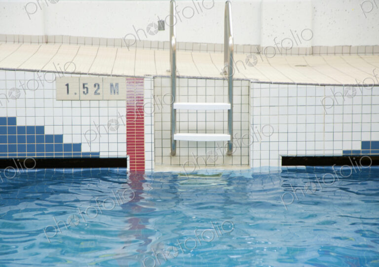 Ladder Going Into a Public Swimming Pool