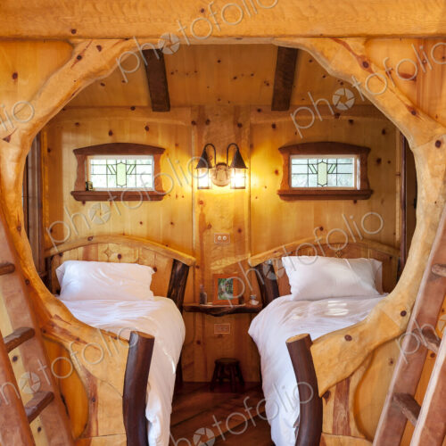Ladders outside bedroom of wooden tree house