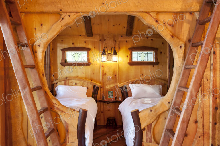 Ladders outside bedroom of wooden tree house